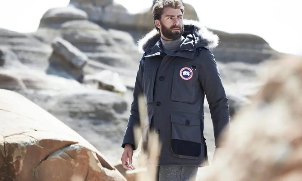 A man wearing a Canada Goose parka jacket.